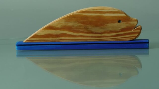 Tiger fish wooden figurine stop motion, loop