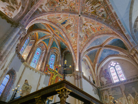 Interior View of the Basilica of Saint Clare in Assisi with Gothic Frescoes, Stained Glass Windows and the High Altar Crucifix