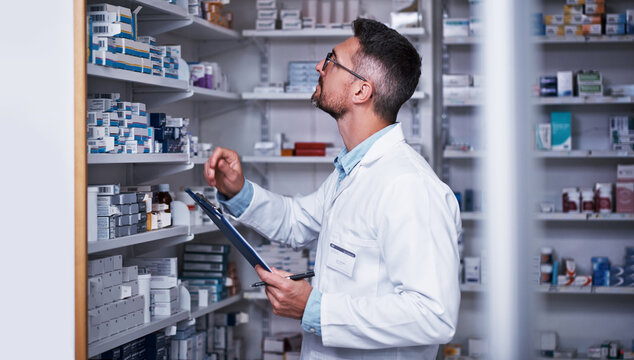 Pharmacist, man or clipboard with shelf inspection for inventory check, medical info and expiry date. Chemist, mature person and checklist in store for stock count, quality assurance and dispensary