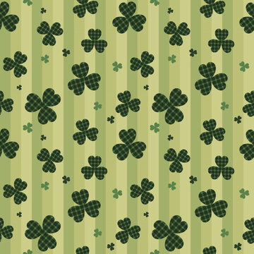 Seamless St. Patrick's Day shamrock pattern with green plaid clovers and vertical stripes. Ideal for Irish holiday backgrounds, lucky clover wallpaper, festive gift wrap, and spring fabric designs.