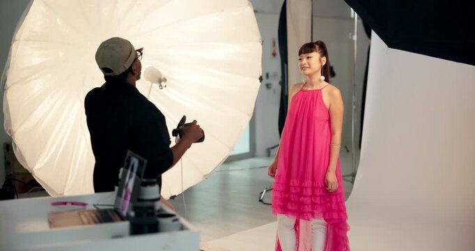 Studio, woman and model with photographer for fashion photoshoot, production process and picture. Photography, bts and capture image with people, aesthetic style and talking in creative industry