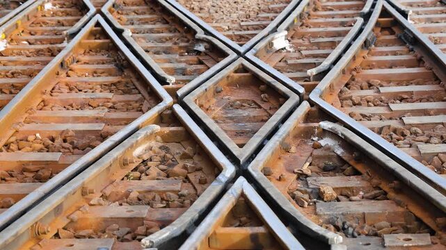 railway track junction with multiple rail lines intersecting