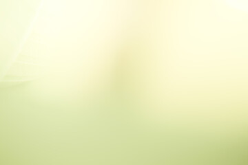 Soft pastel gradient background with smooth light green and cream tones, creating a calm minimalist abstract composition suitable for modern design projects