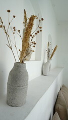 Photo of aesthetic decorative display of fake ornamental plant pots