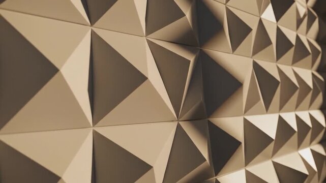 A modern geometric wall features a repeating pattern of three-dimensional
