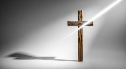 Wooden Cross Standing Upright with Shadow and Light Beam in Grey Studio