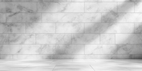 Fototapeta premium Empty minimalist interior with white veined marble tiled wall and floor and soft diagonal sunlight creating a calm, serene atmosphere