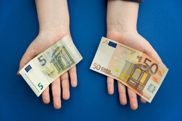 I count money for rent. The concept of saving money. Finance, business, investment. Saving savings at home. Spending cash on losses, real estate, debts, taxes. Inflation, poverty, economic crises.