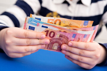 I count money for rent. The concept of saving money. Finance, business, investment. Saving savings at home. Spending cash on losses, real estate, debts, taxes. Inflation, poverty, economic crises.