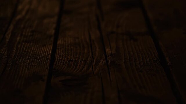 Dark wood background texture rustic vintage plank timber board floor table surface warm light wooden texture illumination cozy mood chinese new year atmosphere celebration night interior decor