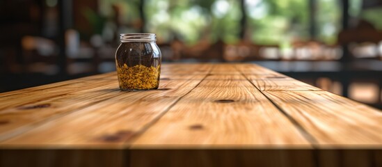 Jar of Pickled Garlic Cloves on Rustic Wooden Table.