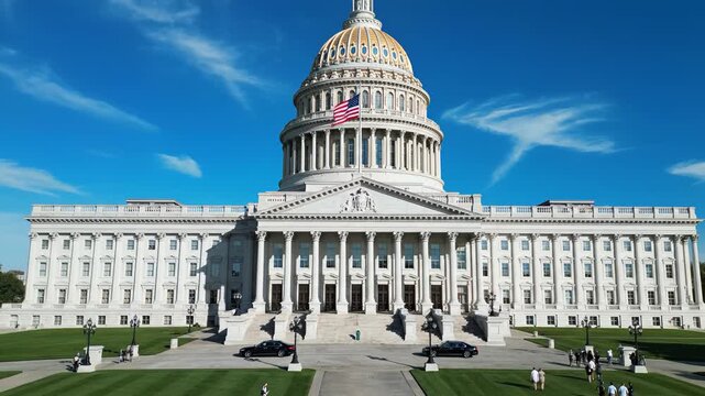 White building with dome and flag