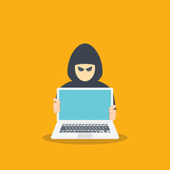 hacker in front of his computer committing digital cybercrime