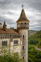 Obraz premium Rocamadour, France - 09 06 2026 : Historic clifftop town of Rocamadour in Lot region showcasing ancient stone architecture religious monuments and dramatic vertical village layout