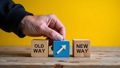 Old way to new way concept with hand placing arrow block, business change and direction strategy