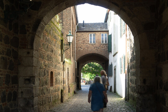 Historic Stone Archways and Cobblestone Street in the Medieval Fortress Town of Zons Germany