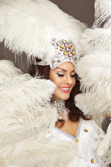 Glamorous Showgirl in White Feather Costume