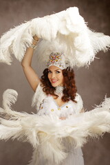 Glamorous Showgirl in White Feather Costume