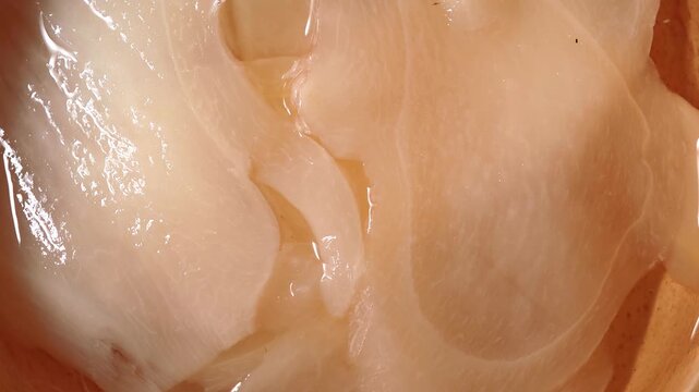close-up of pickled ginger in a bowl.