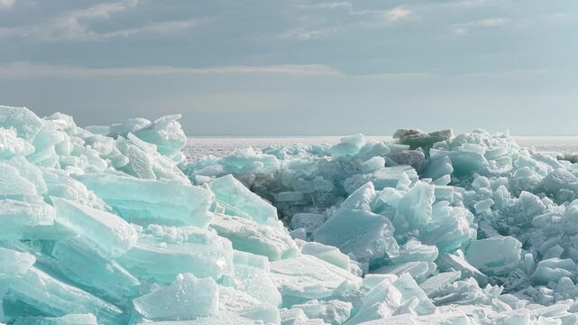
Hummocks on the Kapchagai reservoir. Ice blocks covering the lake. Winter time. The view from the drone.