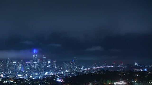 San Francisco Bay Bridge and Downtown Skyscrapers Lights Night Time Lapse California USA