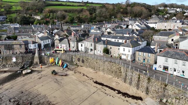 Aerial view Over Mousehole Harbour In Cornwall, UK.