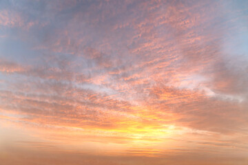 abstract background of cloudy sunset sky golden hour