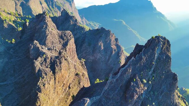 Aerial drone footage revealing volcanic landscape from Roque de los Muchachos, La Palma