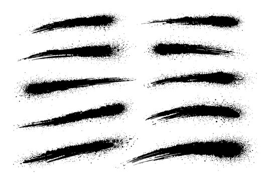 Set of grunge black brush strokes with rough textures and splatter effects.