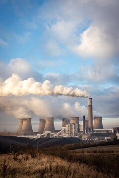Power station generating energy with cooling towers pollution