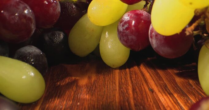 Vast Grape Pathway With Warm Atmosphere. Wide Shot Of Grape Clusters Creating Tunnel Under Warm Lighting