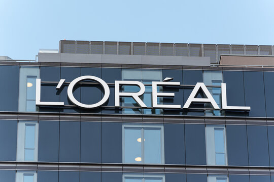 L&rsquo;Or&eacute;al company logo displayed on modern office building facade