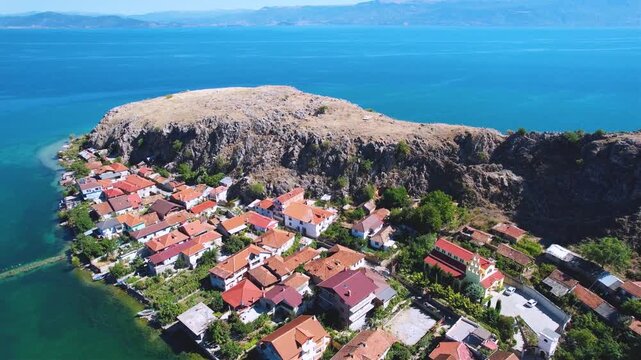 Lin village, perched on a rocky peninsula of Lake Ohrid, blends serene waters with the beauty of its ancient mosaic. Pogradec, Albania 8 January 2026