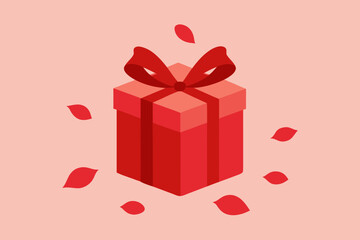 A red gift box with a bow and rose petals