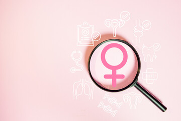 Women healthcare and gynecology checkup. Magnifying glass on pink gender sign with medical icons. Symbol of reproductive system, breast cancer awareness, hormone balance, and lady wellness.