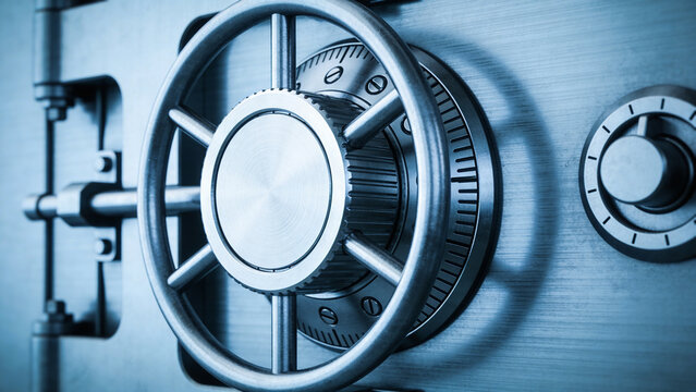 Close-up of a heavy steel bank vault door with a circular handle. Secure metal safe mechanism background. Security and finance concept