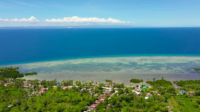 Tropical beach with sea and palm. Beautiful beach and tropical sea. Pangangan island, Bohol, Philippines. Summer and travel vacation concept.