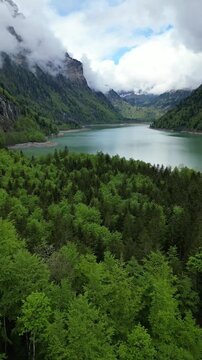Lake Kl&ouml;ntal mountain landscape Glarus canton Switzerland Swiss travel destination vertical video
