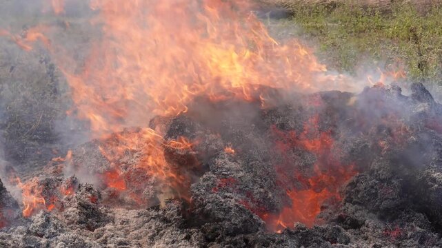 Molten Lava Flow with Flames and Smoke
