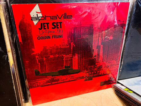 Alphaville Jet Set Jellybean Mix Golden Feeling 1985 vinyl cover art with red city skyline