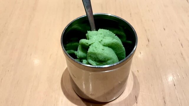 Wasabi (Eutrema japonicum or Wasabia japonica) or Japanese horseradish is a paste made from its ground rhizomes is used as a pungent condiment for sushi and other foods.