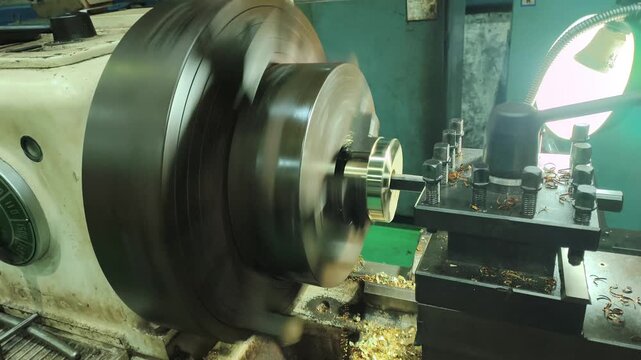 Precision inner boring process of a jackscrew bushing on a lathe machine in an industrial workshop.