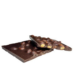 Dark chocolate bar pieces with whole hazelnuts