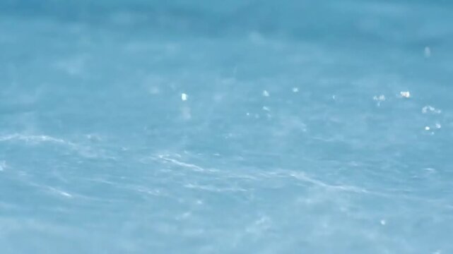 Gentle Water Movement Subtly animated water ripples creating a soothing, repetitive pattern of light.