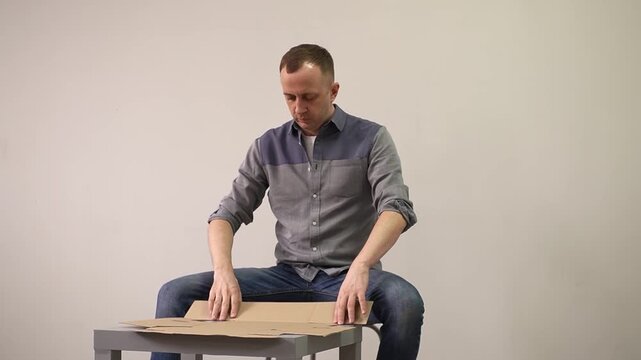 Craft box. Self-assembly box. Cardboard box. Slow motion video. High quality 4k footage
