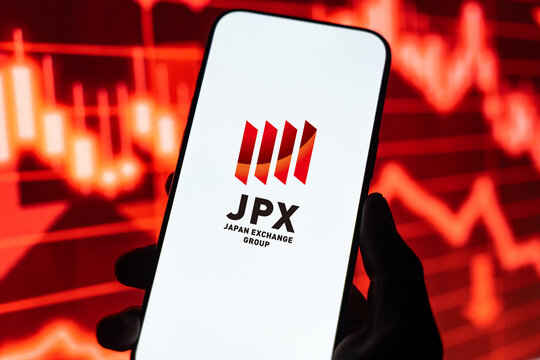 Japan Exchange Group logo is displayed on the screen of a smartphone, in Bangalore, India, on February 12, 2026