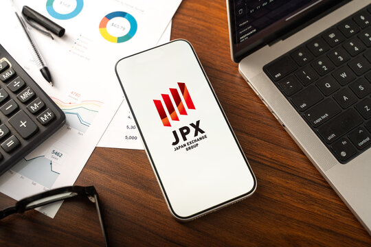 Japan Exchange Group logo is displayed on the screen of a smartphone, in Bangalore, India, on February 12, 2026