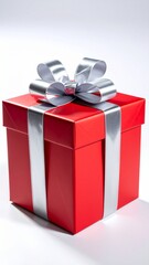 Red Gift Box with Silver Ribbon and Bow for Celebrations and Special Occasions Vertical Studio Shot.
