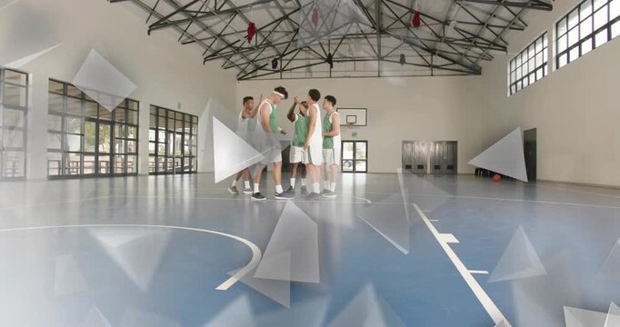 Five sports players huddling on court camera starting shards drifting among players planning play