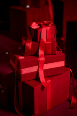 Luxury red gift boxes with satin ribbons for premium celebrations